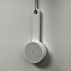 Designer Gerhardt Kellermann developed a shower and kitchen radio, inspired by the Muji wooden brush. This interpretation uses the speaker as a volume control.