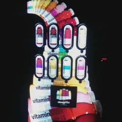 Last night, while leaving the grocery store, I saw the Vitamin Water vending machine in the darkness. It blew my mind!