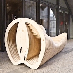 Wooden bench by XS Architecture.