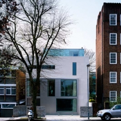 James Gorst Architects' Leaf House in central London, is a fortress-like, 21st-century 'Georgian' townhouse topped with a glass study room.