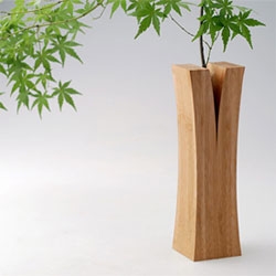"Split wood" vases from the Laminated Bamboo Lumber Project by Japanese design collective Teori. Yum. 