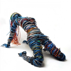Connected is an amazing self-portrait created by Kasey McMahon using steel, CAT5 and other data cables. Maybe it's the new statue of liberty or maybe a requiem for this new digital generation... 