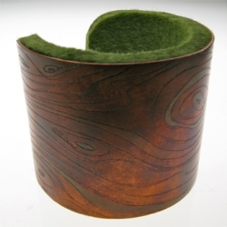 Copper and felt cuff bracelet inspired by natural surroundings from Portland designer Nicole Fischer.