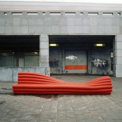 Twisted subversion of landscaping service pipe to form modular  organic furniture - nice one.