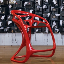 Stool with fluid systems, based on natural and sinuous distortion, linking seat and supporting structure through a series of sculptural links. By Mahdi Naim.