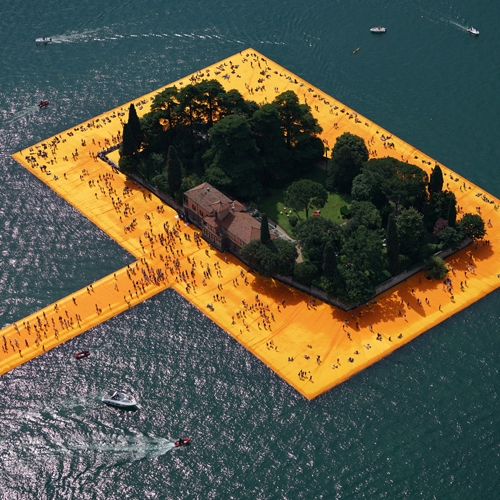 Christo's Floating Piers opens on Lake Iseo in Italy allowing visitors to walk on water