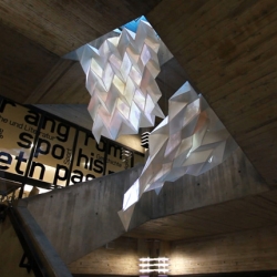 For their 350th year anniversary, The University of the Arts Bremen created a striking paper installation over their library staircase.