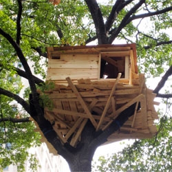 Samantha Hahn photographed Tadashi Kawamata's installation in NYC's Madison Square Park- “Tree Huts", which "seeks to explore the architecture of shelter and the idea of placing what is decidedly a private place, a home, into a public space.”