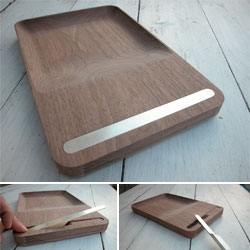 Jorre Van Ast, Mathias Hahn & Tomás Alonso collaborated to design the Ventiquattro Food Bag - a cutting board made of American oak and paired with a flush, sterling silver knife. Come with a washable synthetic bag.