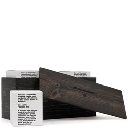 Love this Flammable Wood Gift Box by Baxter of California - comes with three soy wax-based candles. You can burn the gift box when you're done - or you can keep it - whatever floats your boat!