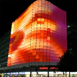 Love this giant pixelated facade on a parking garage in Adelaid - so much more fun that Times Square's typical jumbo screen. Each of the 748 square panels of the Rundle Lantern are lit by two LEDs.
