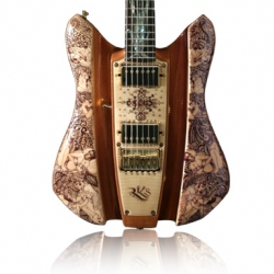Kama Sutra Guitar features hand-painted henna illustrations  based on KamaSutra book, moves or call anything you want.  I just notice now that is "art".