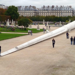 Argentine artist Adrián Villar Rojas sticks a massive extraterrestrial toothpick into Paris's Tuileries Gardens with his new sculpture 'Poem for Earthlings'.