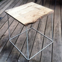 Raw wood coffee table by Alexandre Reignier.