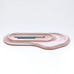 'Ceramic feeld' is a glazed ceramic tray for your pen, with soft lines and organic curves inspired by topography.