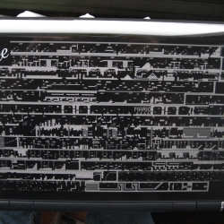 Flickr user, revolvingdork, had his Eee PC etched with every level map of Super Mario Land.
