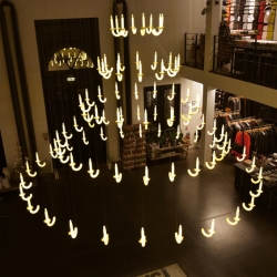 'Wersailles' Invisible chandelier by design studio Beau et Bien, Christmas installation for the concept store Merci, in Paris, France.