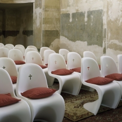 Panton and Eames Eiffel chairs used to brilliant effect in the St. Bartholomew's Church by Maxim Velcovsky.