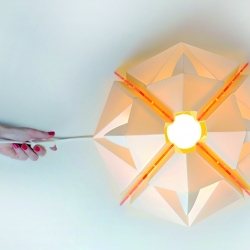 SURIA Luminary is inspired by mandalas. It has been designed, taking into account the folding concept, based on the use of paper engineering techniques. Designed by Agustina Ruiz.