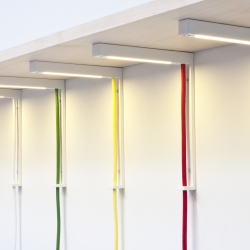 Lightbracket by ALEXALLEN Studio - a clever and playful solution for a shelf bracket and under shelf light combined into one. Can also be used as a wall sconce.