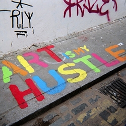 One of the U.K's emerging talent's 'T.Magic' hits up the streets of London with his most recent stencil 'Art Is My Hustle'. I can see some Warhol influence in his slogans.
