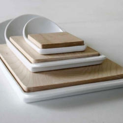 Cut & paste combines the functions of a wooden cutting board with the functions of a small porcelain container - creating a charmingly spoonlike object. 