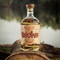 'Alcoholidays' is One Trick Pony’s annual holiday self-promotion. This year they sent clients tequila bottles concealed in a hollowed wooden log, with a custom wooden label and shot glass.