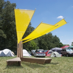 Bow Line, a sculpture created by Jason S. Brown, Christopher King, and Brian R. Jobe, is currently on view this weekend at Bonnaroo Music & Arts Festival 2012. Located at Pod 7, the sculpture is a rest stop for festival attenders.