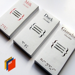Choco Shock bars enable visually-impaired to recognize varieties of chocolate by touch. Packaging design by Andrea Giorgi.