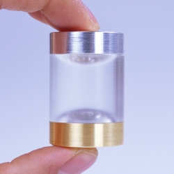 Hemisphere - a beautifully crafted storage system for your contact lenses. Different colored end caps in hand lathed brass and aluminum signify right and left lenses.