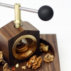 'The Walnut Set' Nutcracker by DDQ Design. This set reinstates a calming elegance to the act of cracking a nut open before eating it.