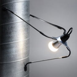 spYder light from daast - a simple concept of attaching flexible magnetic legs to a light bulb so it can act a bit like a spider and attach to metal surfaces in different positions.