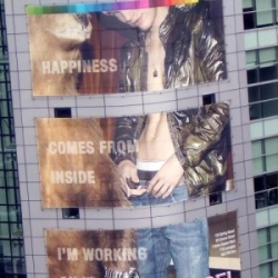 A truly strange new Diesel billboard ad that is very hard to explain. ‘Happiness comes from inside. I'm working on it.’