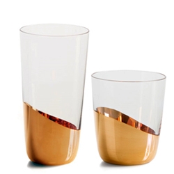 'Midas' glass and carafes collection by FRONT for Skitsch. Dipped in a gold bath, they propose a contemporary and ironic version of luxury. Wine, champagne and water glasses + small/medium carafe.
