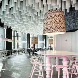 Designed by Jordi Gali, the Barceló Raval hotel in Barcelona, Spain, features 2200 Basotect ceiling baffles made from BASF's flexible melamine resin foam.