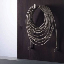 Brilliant radiator from Ad Hoc, like a water hose, it can be left hung on the hook, or spread around the house to heat specific areas. 