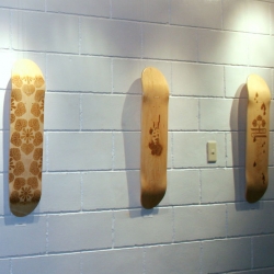 wood etching on skateboard by nico puertollano, pablo gallery, cubao philippines
