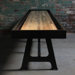 District Millworks out of Los Angeles CA, is hand making custom Shuffleboard tables from reclaimed oak set on steel with industrial era throwback base.