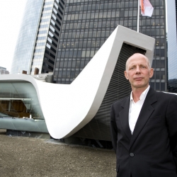 UN Studio’s Ben van Berkel poses with the New Amsterdam Pavilion which opened in Battery Park, New York on September 9 and is expected to attract over six million visitors annually.