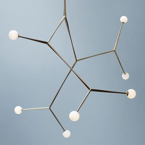 Ligo, a systemic modular chandelier by Jailmake. The triad of modular branches make up the fundamental framework of the chandelier. Tapered at one end, they attach via a hidden screw fixing to form any number of arrangements.