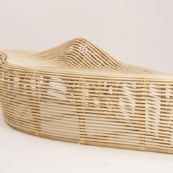 Neat outdoor bench made out of bamboo, with a very nice design. 