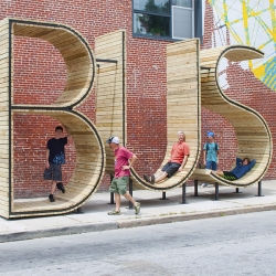 BUS - Courtesy of collab group mmmm... and Baltimore's new Transit - Creative Placemaking program. The team who brought you NYC's Meeting Bowls transforms bus benches into a type-driven sculpture.