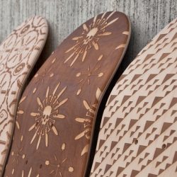 The design team at Magnetic Kitchen have crafted up a series of intricate laser engraved skateboard decks.