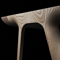 The sculptural Maya Desk by James Melia for Dare Studio is intricately carved using a 5 axis CNC.