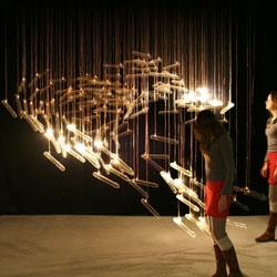 Flylight by Design Drift, fascinating light sculpture that mimics a flock of birds and responds to the presence of people! The video really helps make sense of it...