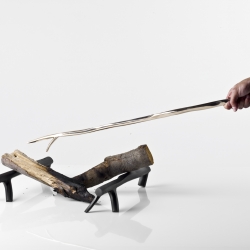 Philippe-Albert Lefebvre industrial design bachelor of University of Montreal has created a range of fire tools by casting hand-carved branches in bronze and iron. Called Bronze Age.