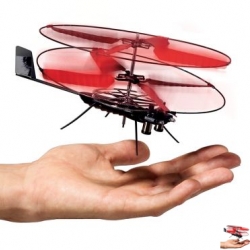 World's smallest remote controlled helicopter!  It has two contra-rotating coaxial rotors that use gyroscopic inertia to keep the copter balanced and two micro-motors that spin the rotors at varying speeds