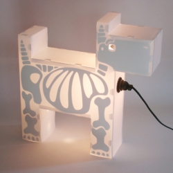 Skeletal flat packed puppy lamp.
