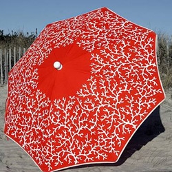 Le Dauphin's beach umbrellas and blankets are just the refreshing pieces we need as beach weather is back in full force