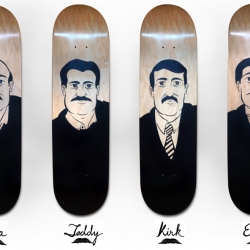 Custom painted mustachioed skate decks by artist Lawrence Melilli. Never has a board been so handsome.